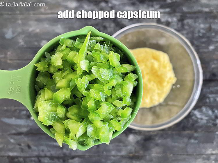 Step 10 – Add&nbsp;<meta charset="UTF-8" />1/2 cup&nbsp;finely&nbsp;<a href="glossary-chopped-capsicum-164i">chopped capsicum</a>.