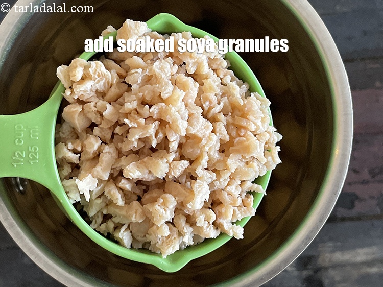 Step 19 – Add the soaked soya granules.