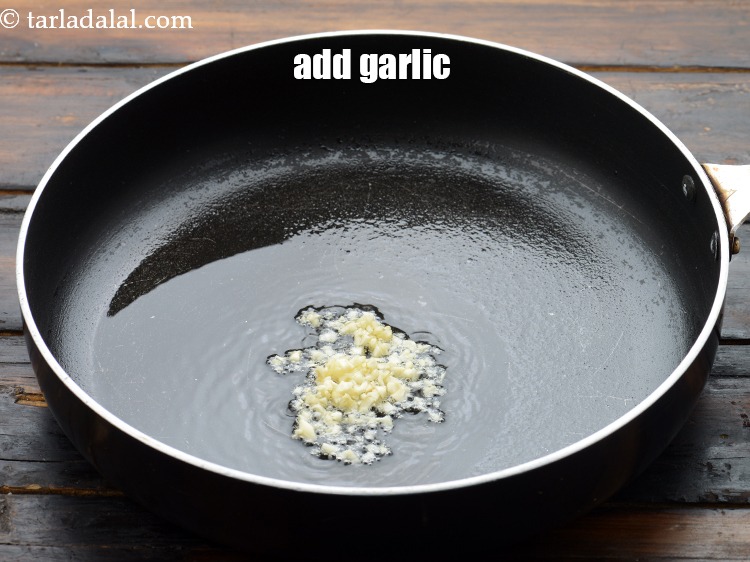 Step 4 – Add 1 1/2 tsp&nbsp;finely&nbsp;<a href="https://www.tarladalal.com/glossary-chopped-garlic-790i">chopped garlic (lehsun)</a>.&nbsp;