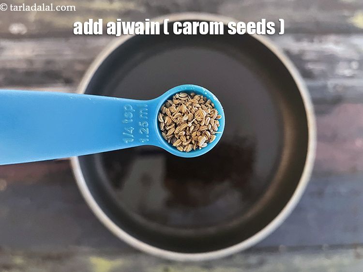 Step 16 – Add&nbsp;<meta charset="UTF-8" />1/4 tsp&nbsp;<a href="glossary-carom-seeds-ajwain-thymol-seeds-bishops-weed-266i">carom seeds (ajwain)</a>.
