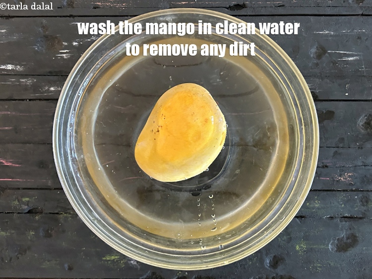 Step 11 – Wash the mango very well with clean water to make it free of dirt if …
