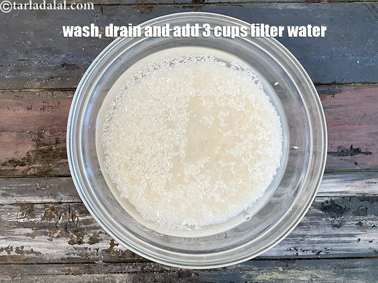 Step 5 – Rice is washed, and drained and<strong> 3 cups of filtered water is added.</strong> <u><em>We will …