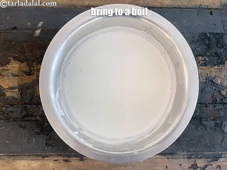 Step 14 – Bring it to a boil on a medium high flame. This would take around 8-10 …
