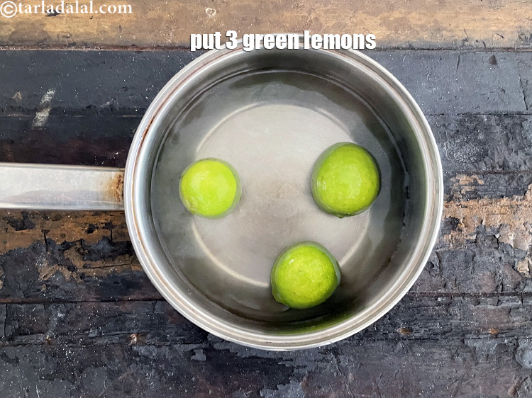 Step 5 – Put 3 lemons into the boiling water.