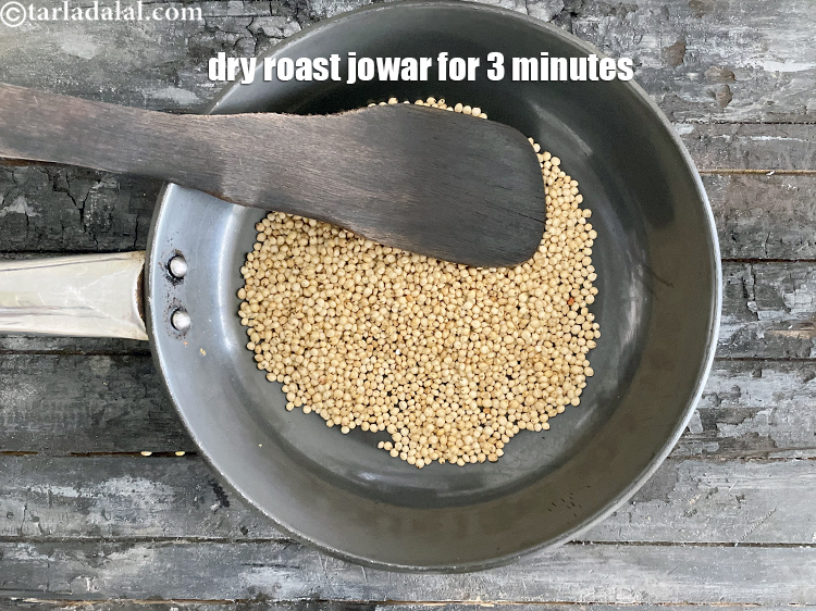 Step 5 – Dry roast the jowar seeds for 3 minutes stirring occasionaly till they browning and leaving …