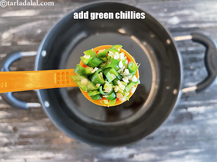 Step 16 – Add&nbsp;<meta charset="UTF-8" />1 tsp&nbsp;finely&nbsp;<a href="glossary-chopped-green-chilli-820i">chopped green chillies</a>.
