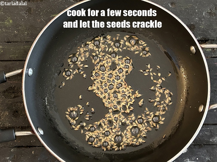 Step 7 – Cook for a few seconds and let the&nbsp;seeds crackle.