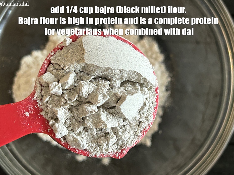 Step 5 – Add&nbsp;<meta charset="UTF-8" />1/4 cup&nbsp;<a href="glossary-bajra-flour-bajra-ka-atta-bajre-ka-atta-176i">bajra (black millet) flour</a>.&nbsp;<a href="https://www.tarladalal.com/recipes-using-bajra-flour-176">Bajra flour</a>&nbsp;is&nbsp;<a href="https://www.tarladalal.com/recipes-for-Protein-Rich-Foods-Indian-Veg-Protein-Rich-Recipes-695">high in protein</a>&nbsp;and is a&nbsp;<em>complete …