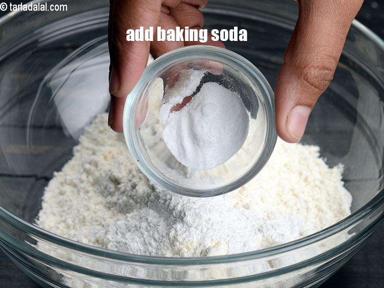 Step 5 – Add &frac12; tsp&nbsp;<a href="https://www.tarladalal.com/glossary-baking-soda-soda-bi-carb-615i">baking soda</a>.