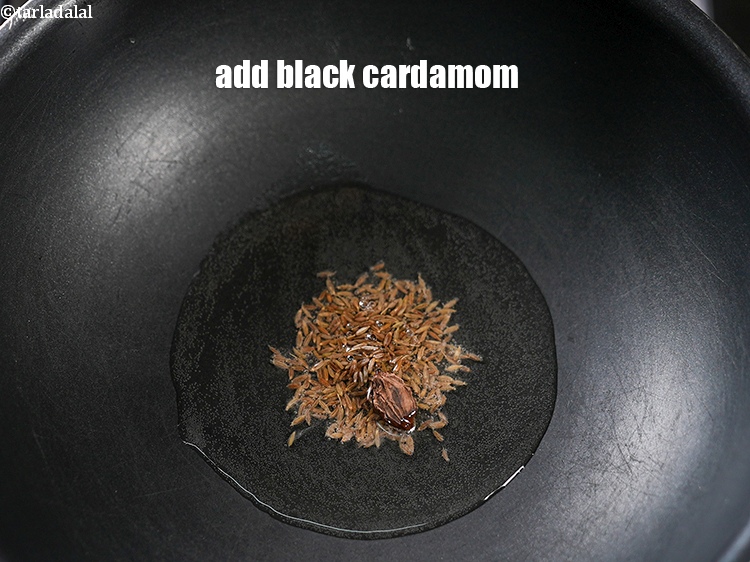 Step 5 – Add 1 black cardamom.
