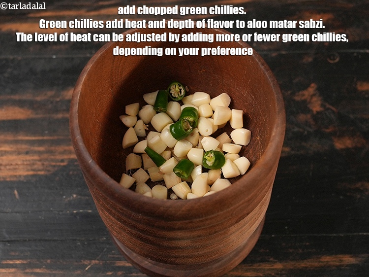 Step 5 – Add 1&frac12; tsp <a href="https://www.tarladalal.com/glossary-chopped-green-chilli-820i">chopped green chillies</a>. Green chillies add heat and depth of flavor …