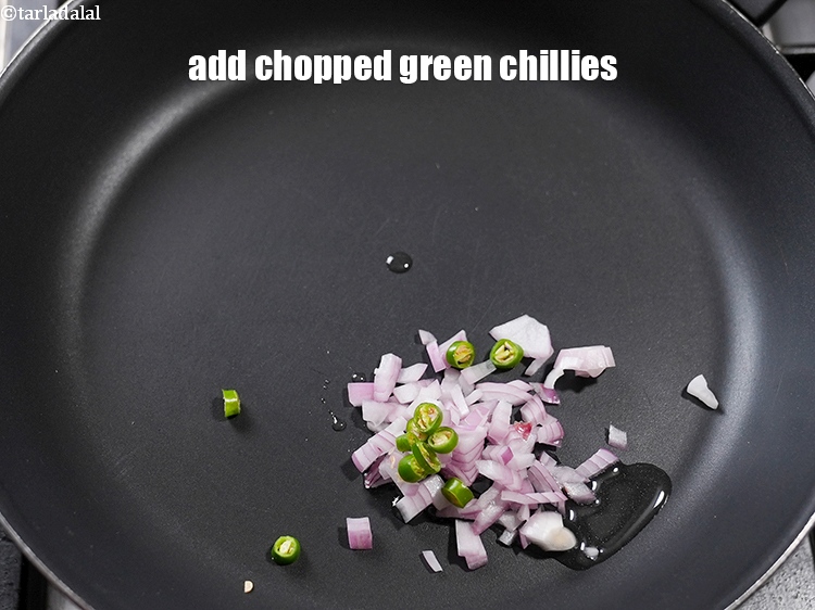 Step 5 – Add 1 tsp <a href="https://www.tarladalal.com/glossary-chopped-green-chilli-820i">chopped green chillies</a>.&nbsp;