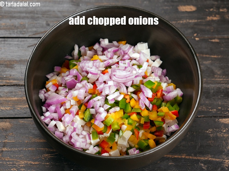 Step 6 – Add 5 tbsp <a href="https://www.tarladalal.com/glossary-chopped-onions-722i">chopped onions</a><br /> .