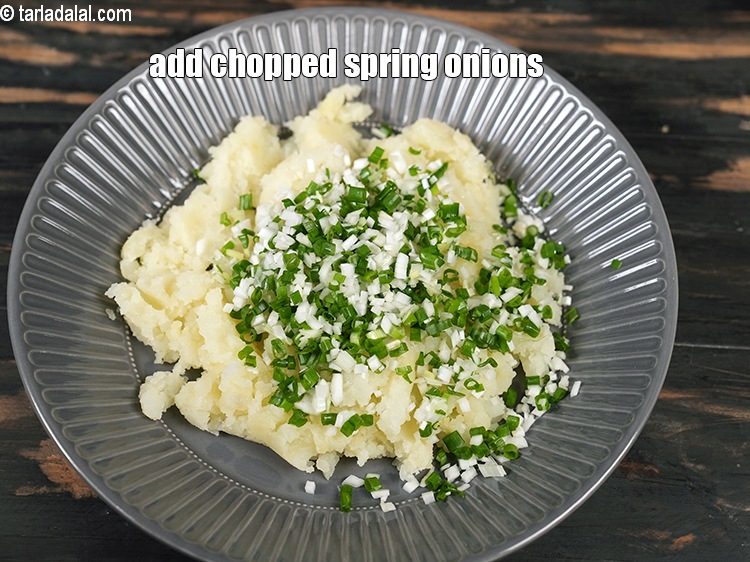 Step 5 – Add &frac12; cup finely chopped spring onion whites and greens.