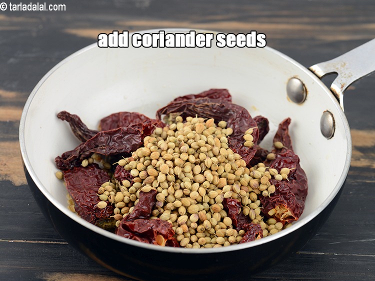 Step 6 – Add 2 tbsp <a href="https://www.tarladalal.com/glossary-coriander-seeds-dhania-ke-beej-dhania-seeds-akha-dhania-371i">coriander (dhania) seeds</a>.