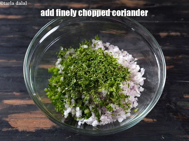 Step 5 – Add &frac14; cup finely <a href="https://www.tarladalal.com/glossary-chopped-coriander-783i">chopped coriander (dhania)</a>.
