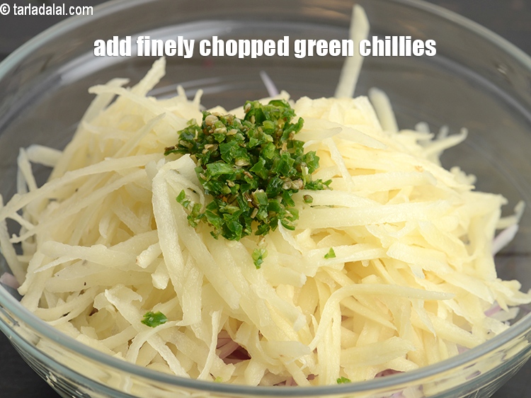 Step 5 – Add 2 tsp finely <a href="https://www.tarladalal.com/glossary-chopped-green-chilli-820i">chopped green chillies</a>.