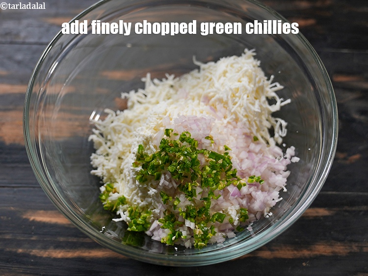 Step 5 – Add 2 tsp finely <a href="https://www.tarladalal.com/glossary-chopped-green-chilli-820i">chopped green chillies</a>.