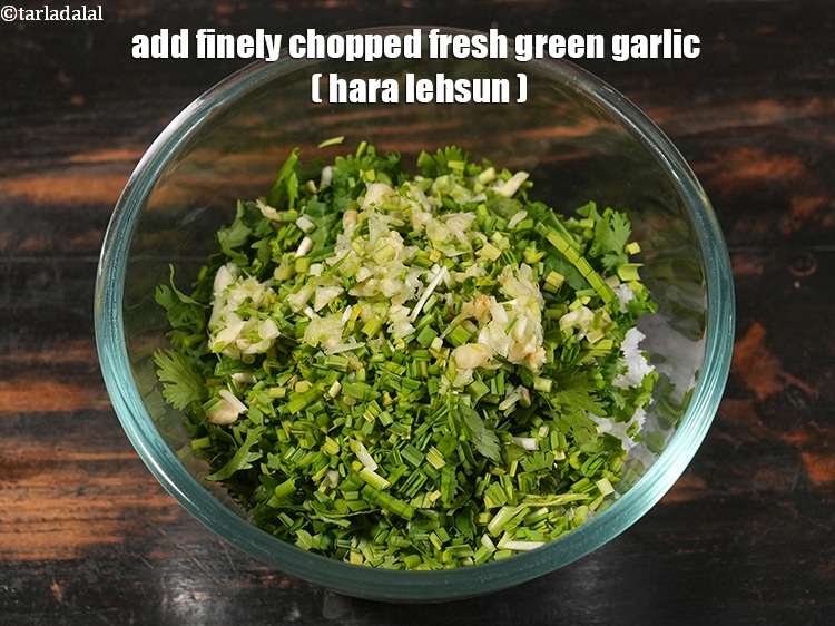 Step 6 – Add 2 tbsp finely&nbsp;<a href="https://www.tarladalal.com/glossary-chopped-green-garlic-849i">chopped green garlic (hara lehsun)</a>. This is generally available in winter …