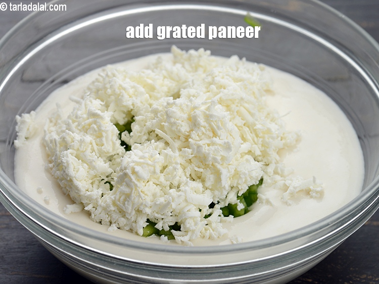 Step 5 – Add &frac12; cup <a href="https://www.tarladalal.com/glossary-grated-panee-1003i">grated paneer (cottage cheese)</a>.