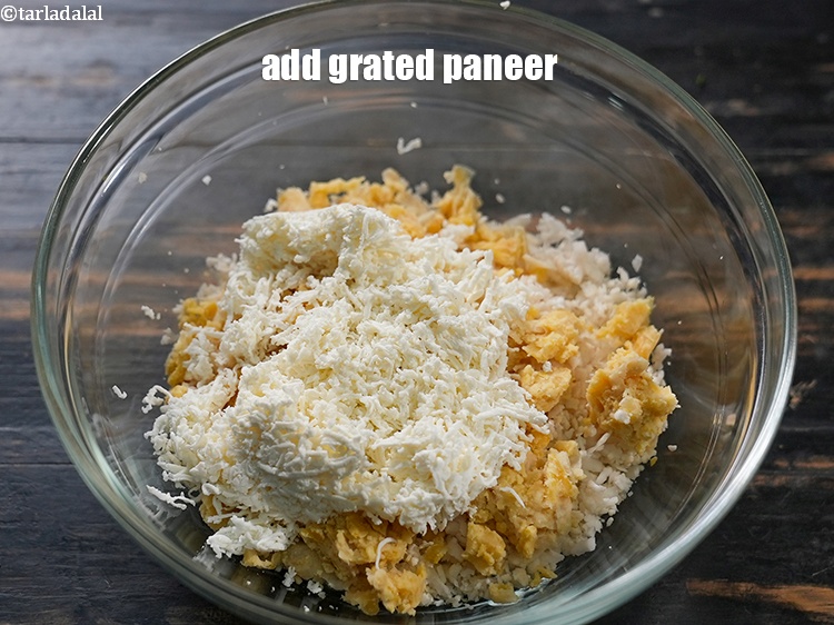 Step 5 – Add &frac12; cup <a href="https://www.tarladalal.com/glossary-grated-panee-1003i">grated paneer (cottage cheese)</a>.