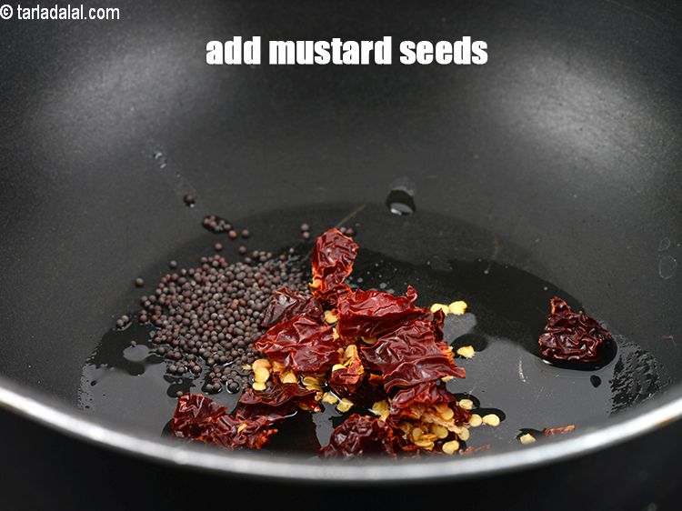 Step 24 – Add 1/2 tsp&nbsp;<a href="https://www.tarladalal.com/glossary-mustard-seeds-sarson-rai-sarson-ke-beej-525i">mustard seeds ( rai / sarson)</a>.