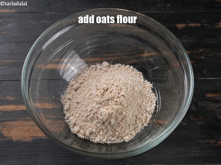Step 5 – Add &frac14; cup&nbsp;<a href="https://www.tarladalal.com/glossary-oats-flour-oats-atta-2201i">oats flour</a>.