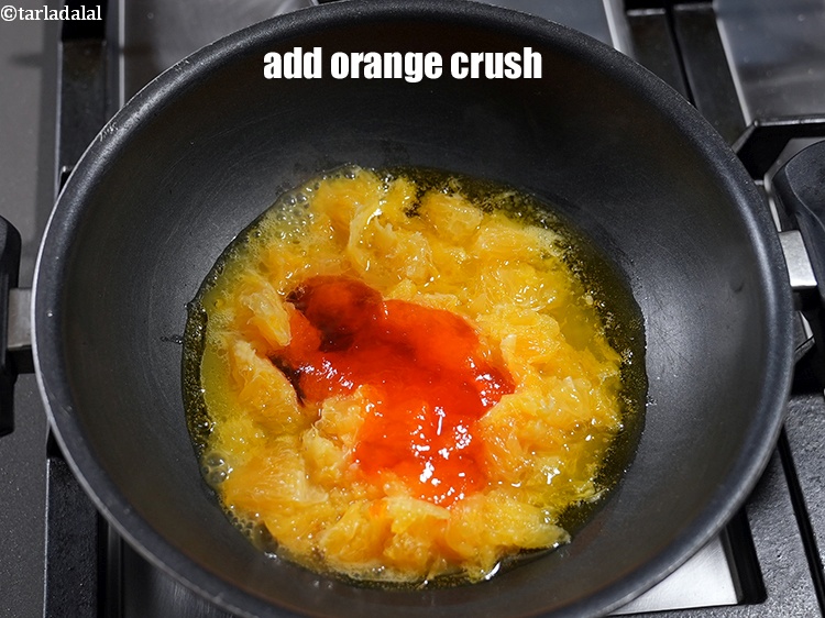 Step 5 – Add &frac14; cup <a href="https://www.tarladalal.com/glossary-orange-crush-santre-ka-crush-1987i">orange crush</a>.