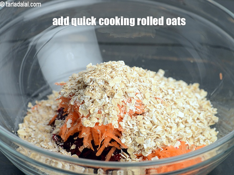 Step 6 – Add 1/2 cup <a href="https://www.tarladalal.com/glossary-quick-cooking-rolled-oats-rolled-oats-547i">quick cooking rolled oats</a>.