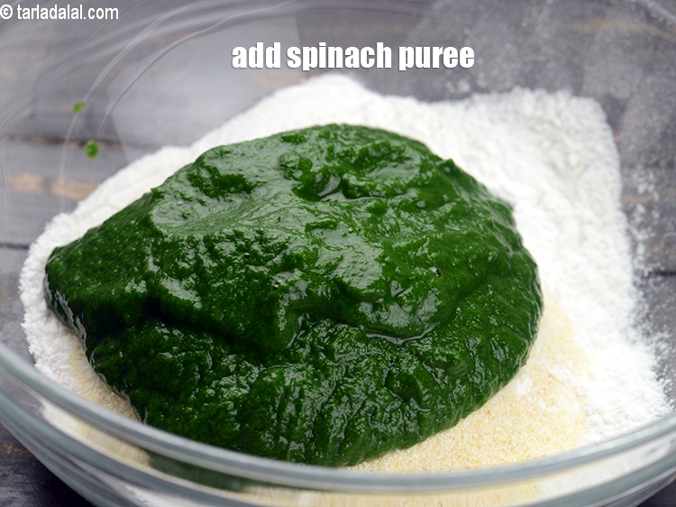 Step 5 – Add &frac12; cup <a href="https://www.tarladalal.com/glossary-spinach-puree-palak-ki-puree-256i">spinach (palak) puree</a>.