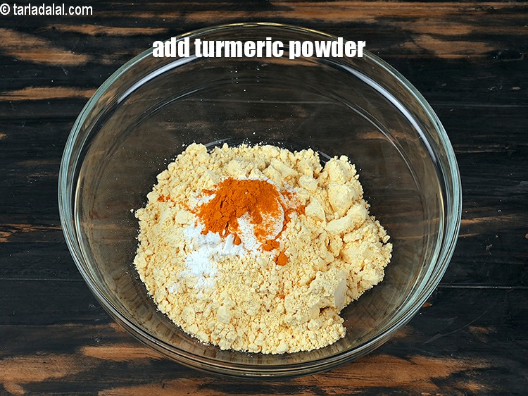 Step 6 – Add &frac14; tsp&nbsp;<a href="https://www.tarladalal.com/glossary-turmeric-powder-haldi-645i">turmeric powder (haldi)</a>.