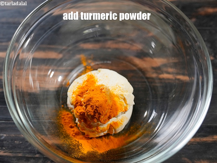 Step 5 – Add &frac12; tsp&nbsp;<a href="https://www.tarladalal.com/glossary-turmeric-powder-haldi-645i">turmeric powder (haldi)</a>.