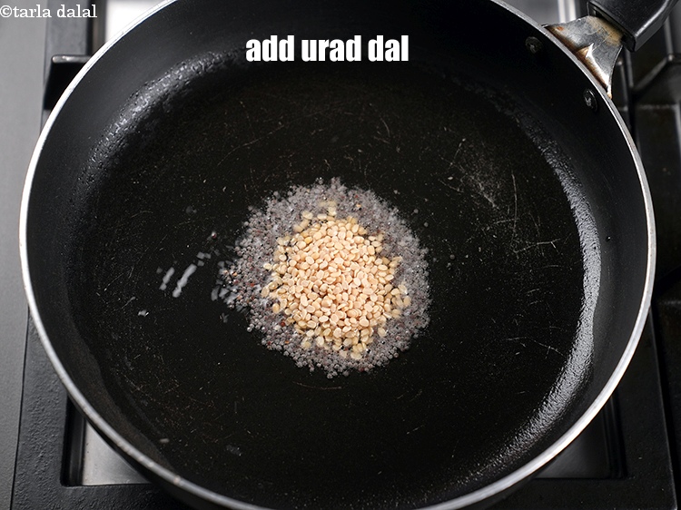 Step 10 – Add 2 tsp urad dal.