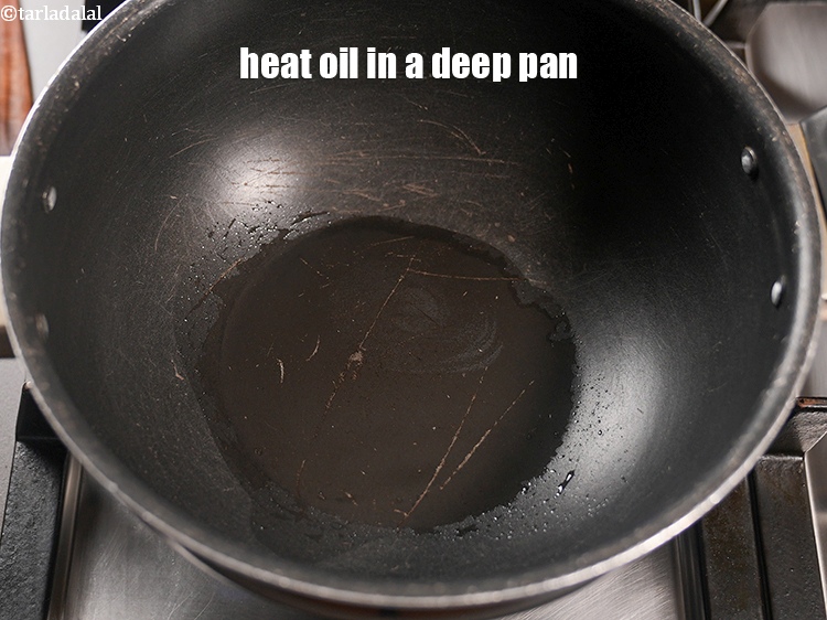 Step 5 – Heat 2 tsp oil in a deep pan.