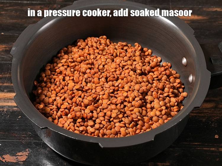 Step 5 – In a pressure cooker, add soaked masoor.