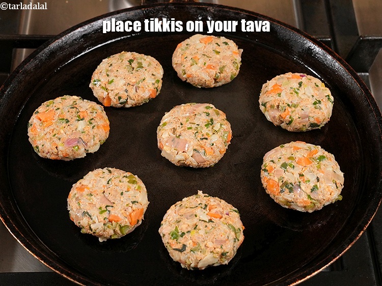 Step 37 – Place 6 to 8 tikkis on your tava and cook bottom side till golden brown.
