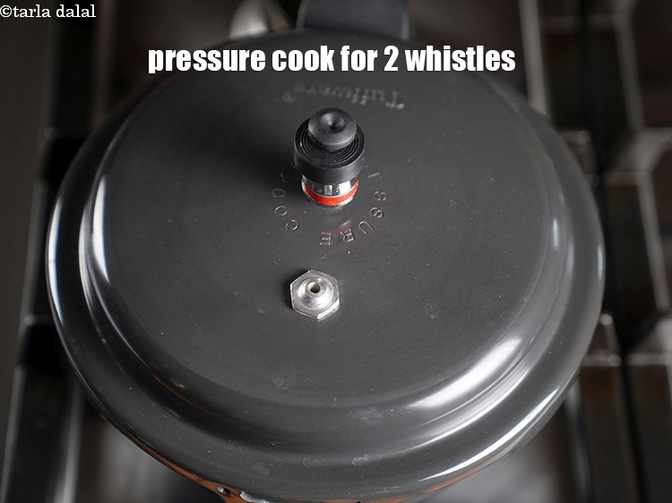 Step 5 – Pressure cook on medium flame for 2 whistles.