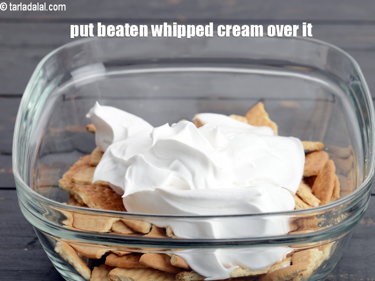 Step 5 – Put 1 cup of&nbsp;&nbsp;<a href="https://www.tarladalal.com/glossary-beaten-whipped-cream-1948i">beaten whipped cream</a> evenly over it.