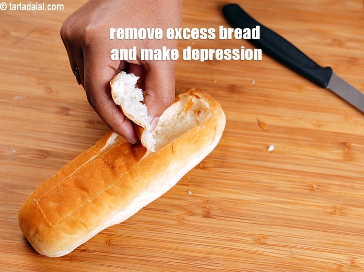 Step 9 – Remove the excess bread and make a depression.