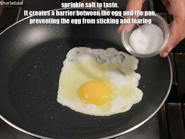 Step 5 – Sprinkle <a href="https://www.tarladalal.com/glossary-salt-namak-table-salt-418i">salt</a> to taste. It creates a barrier between the egg and the pan, …
