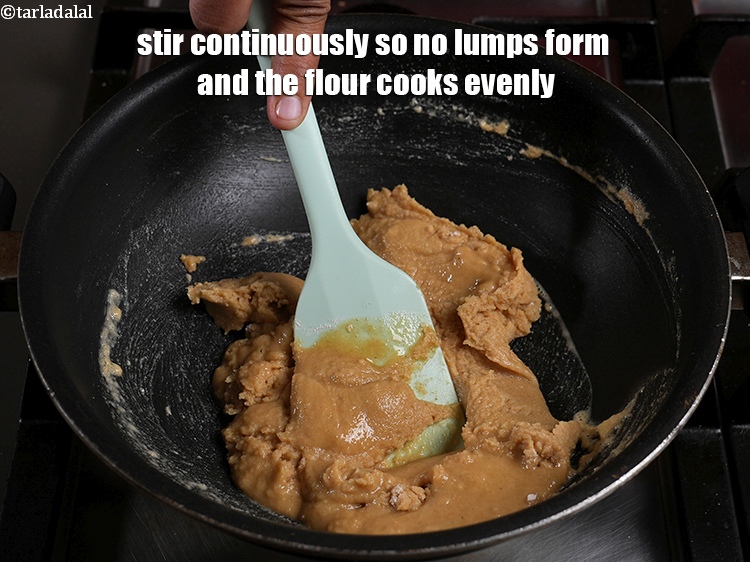 Step 5 – Stir continuously so no lumps form and the flour cooks evenly. <strong>Atte ka halwa</strong> has …