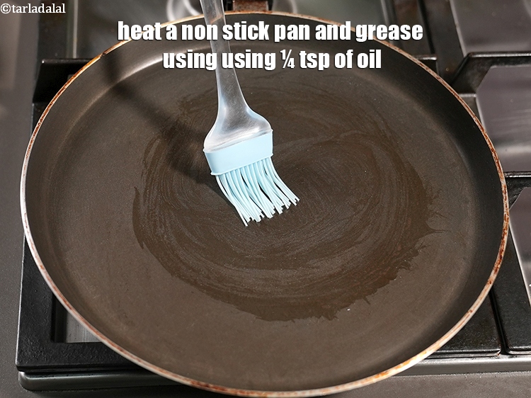 Step 32 – Heat a non stick pan&nbsp;and grease using using &frac14; tsp of oil.