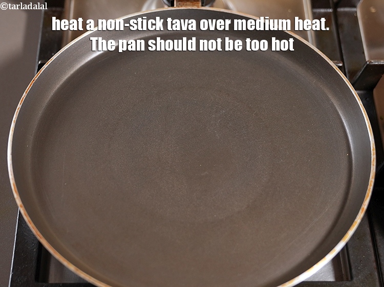 Step 32 – Heat a non-stick tava over medium heat.&nbsp;The pan should not be too hot.&nbsp;<strong>To ensure good …