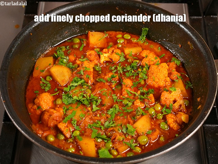 Step 32 – Add&nbsp;2 tbsp&nbsp;finely&nbsp;<a href="https://www.tarladalal.com/glossary-chopped-coriander-783i">chopped coriander (dhania)</a>.