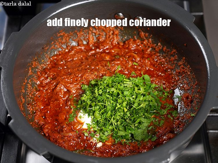 Step 32 – Add &frac14; cup finely chopped coriander.
