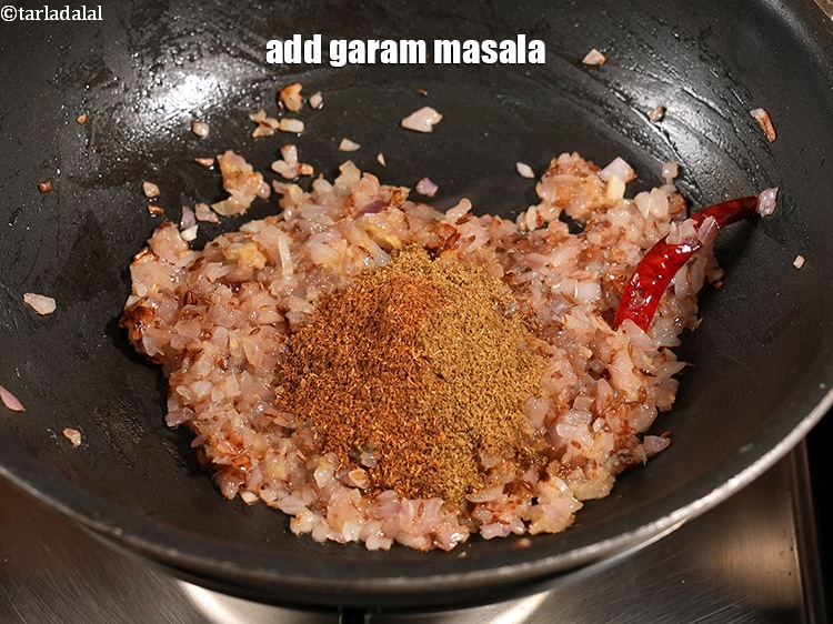 Step 32 – Add &frac12; tsp <a href="https://www.tarladalal.com/glossary-garam-masala-296i">garam masala</a>.