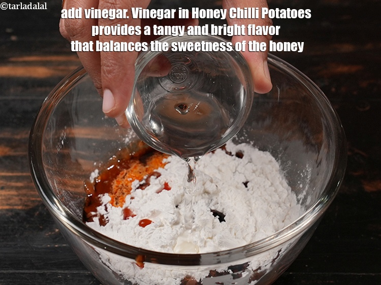 Step 31 – Add 1 tsp <a href="https://www.tarladalal.com/glossary-vinegar-sirka-cooking-vinegar-341i">vinegar</a>. Vinegar in Honey Chilli Potatoes provides a tangy and bright …