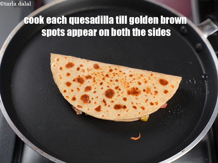 Step 34 – Till golden brown spots appear on both the sides.