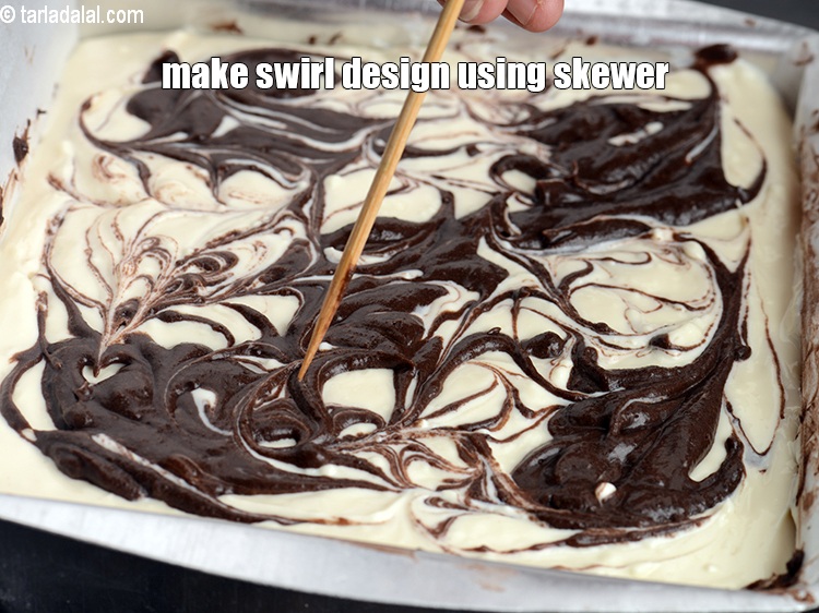 Step 32 – Make a swirl design using a skewer.