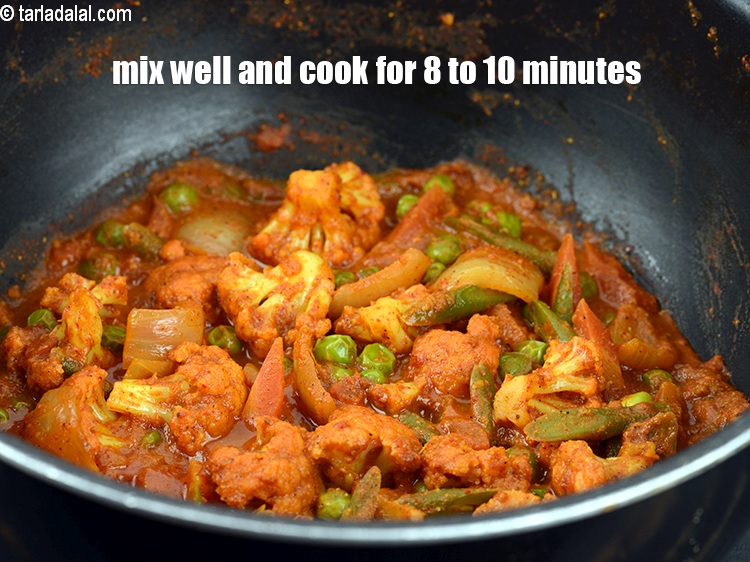 Step 33 – Mix well cover it with a lid and cook on a medium flame for 8 …